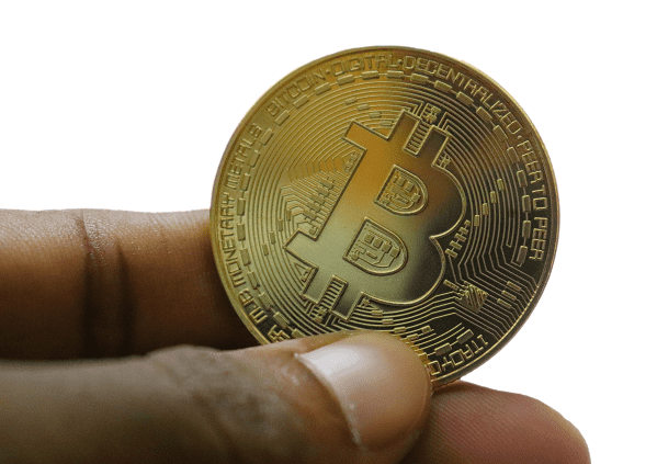 биткойн монета в ръка